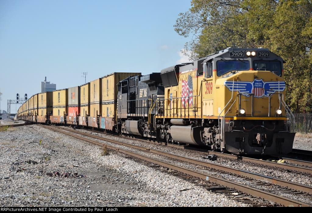 Garbage train crosses over as it heads east